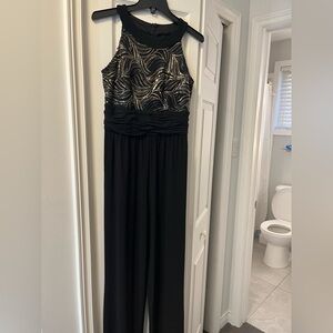 Gold black and silver pantsuit unworn with tags. Sleeveless, gathering at waist